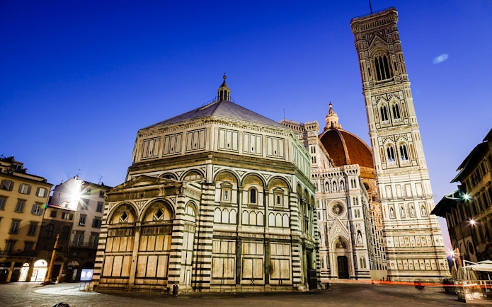 Florence Cathedral and Baptistery at dusk during E-Bike Night Tour.