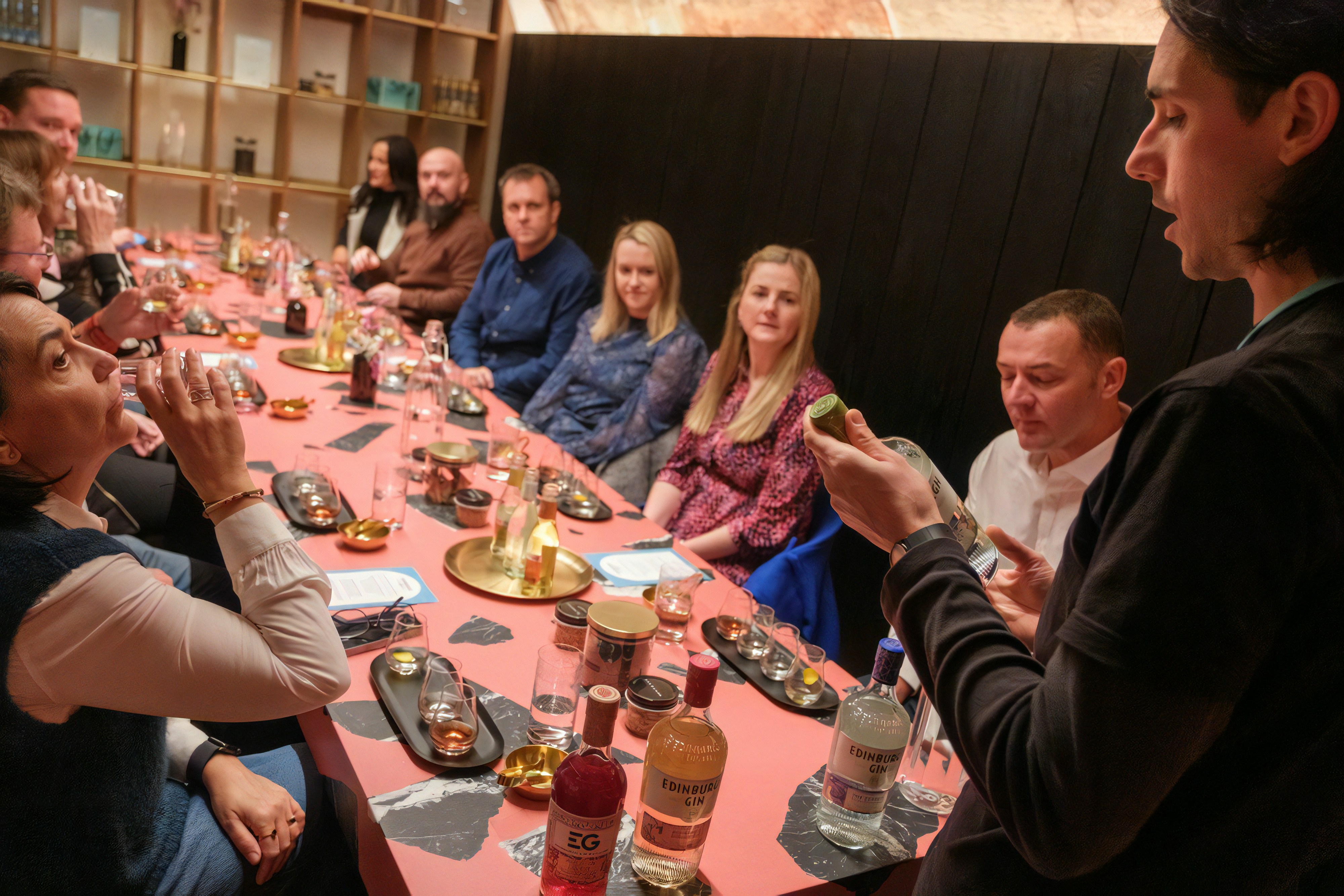 Edinburgh distillery tour showcasing whisky barrels and tasting experience.