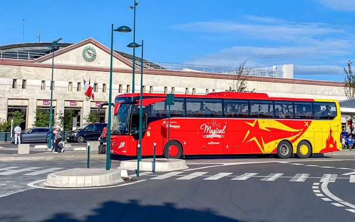 Shuttle bus at Disneyland Paris station for CDG/ORY airport transfer.