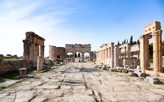 Domitian Gate and Frontinus Street ruins in Hierapolis, Turkey.