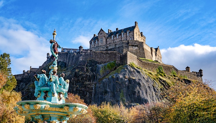 Edinburgh Castle on Castle Rock with Ross Fountain in the foreground, Scotland.