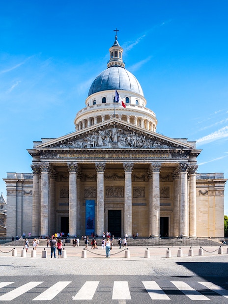 Pantheon in Paris with visitors and surrounding architecture.
