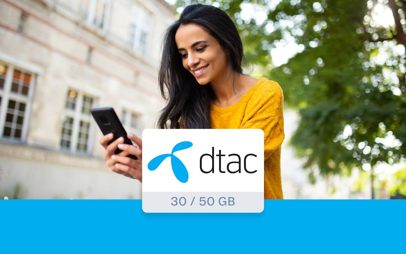 Woman using smartphone with dtac 4G Tourist SIM Card in Bangkok.