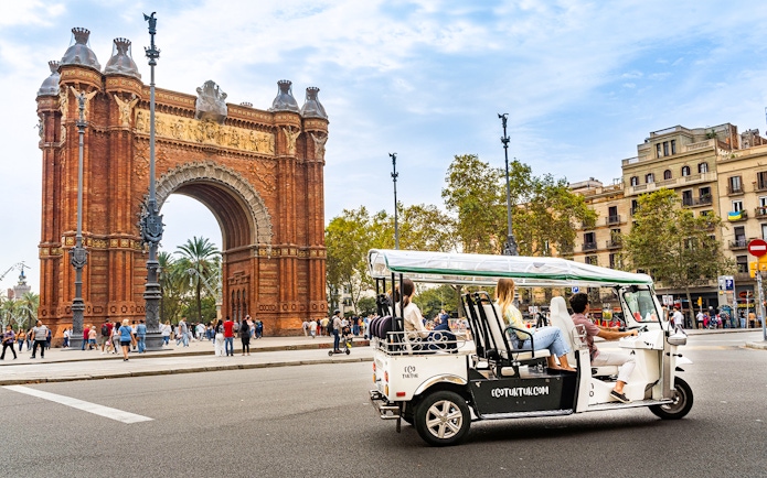 Tuk tuk tour near Arc de Triomf in Barcelona.