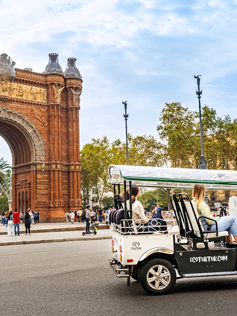 Tuk tuk tour near Arc de Triomf in Barcelona.