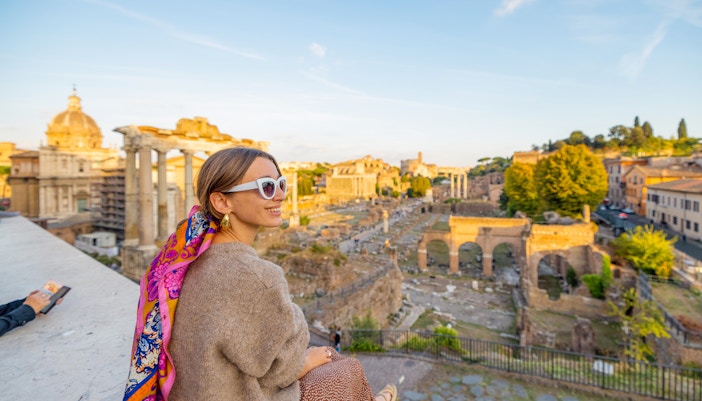 Woman enjoying the view of roman forum