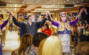Dancers performing traditional Turkish dance on a Bosphorus dinner cruise in Istanbul.