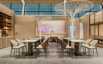 Waiting area seating with modern decor at Shanghai Pudong International Airport Terminal 2.