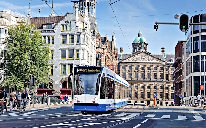 Tram in Amsterdam near Royal Palace on Dam Square, part of GVB Public Transport Pass.