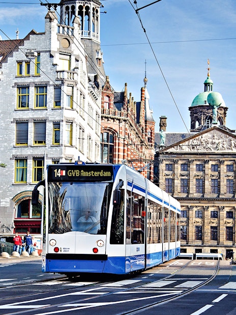 Tram in Amsterdam near Royal Palace on Dam Square, part of GVB Public Transport Pass.