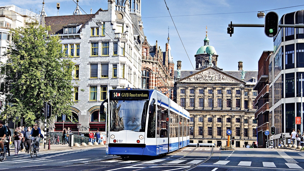 Tram in Amsterdam near Royal Palace on Dam Square, part of GVB Public Transport Pass.
