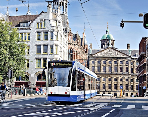 Tram in Amsterdam near Royal Palace on Dam Square, part of GVB Public Transport Pass.