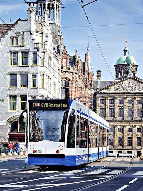 Tram in Amsterdam near Royal Palace on Dam Square, part of GVB Public Transport Pass.