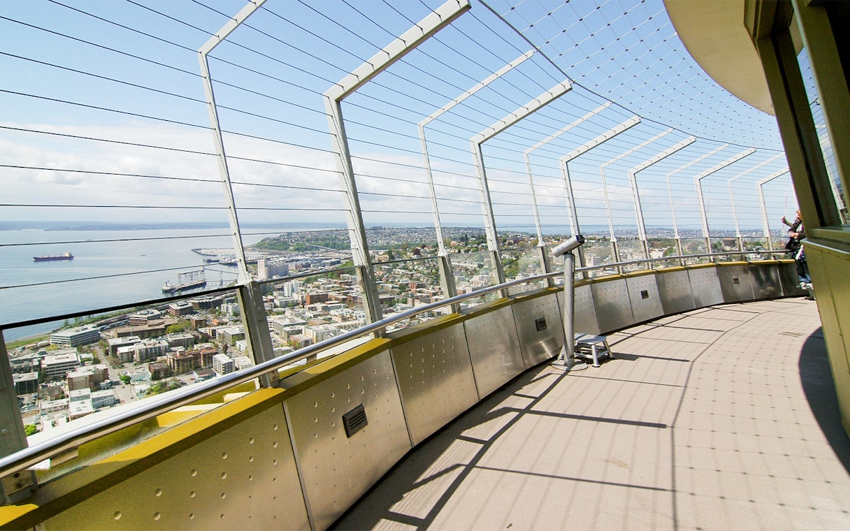 Seattle skyline and waterfront from Space Needle observation deck.