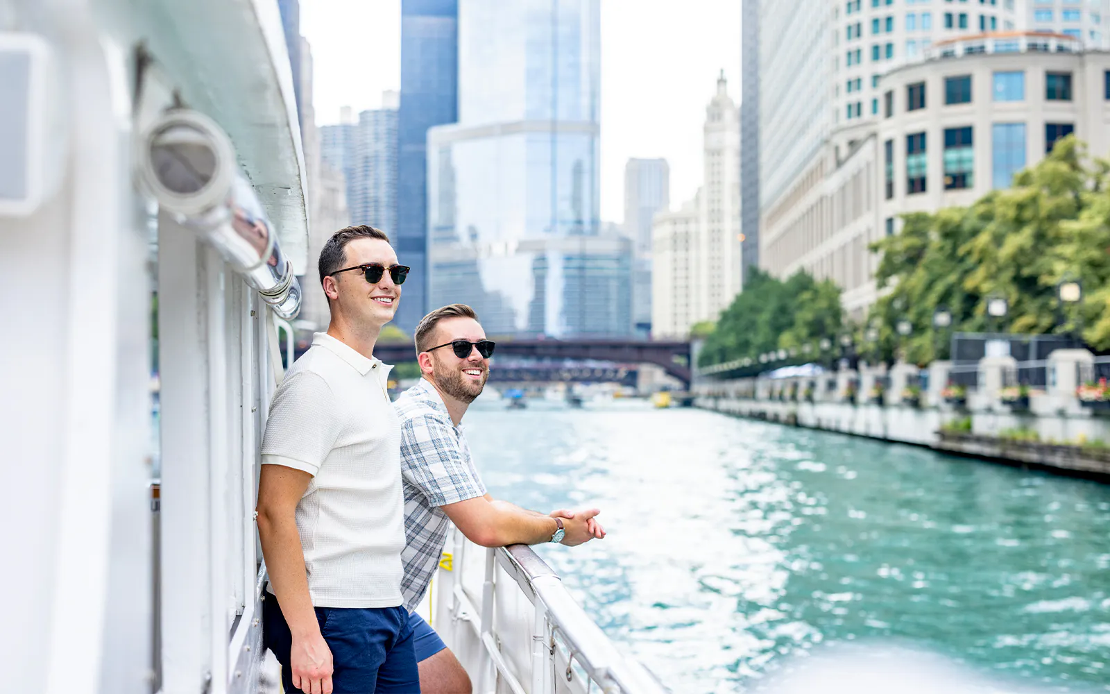 Passengers enjoying views on a Chicago architecture cruise along the river.