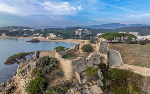 Ruins of Castell de Sant Esteve de Mar on a cliff overlooking Palamós, Baix Empordà.