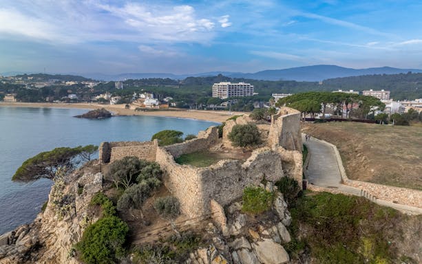 Ruins of Castell de Sant Esteve de Mar on a cliff overlooking Palamós, Baix Empordà.