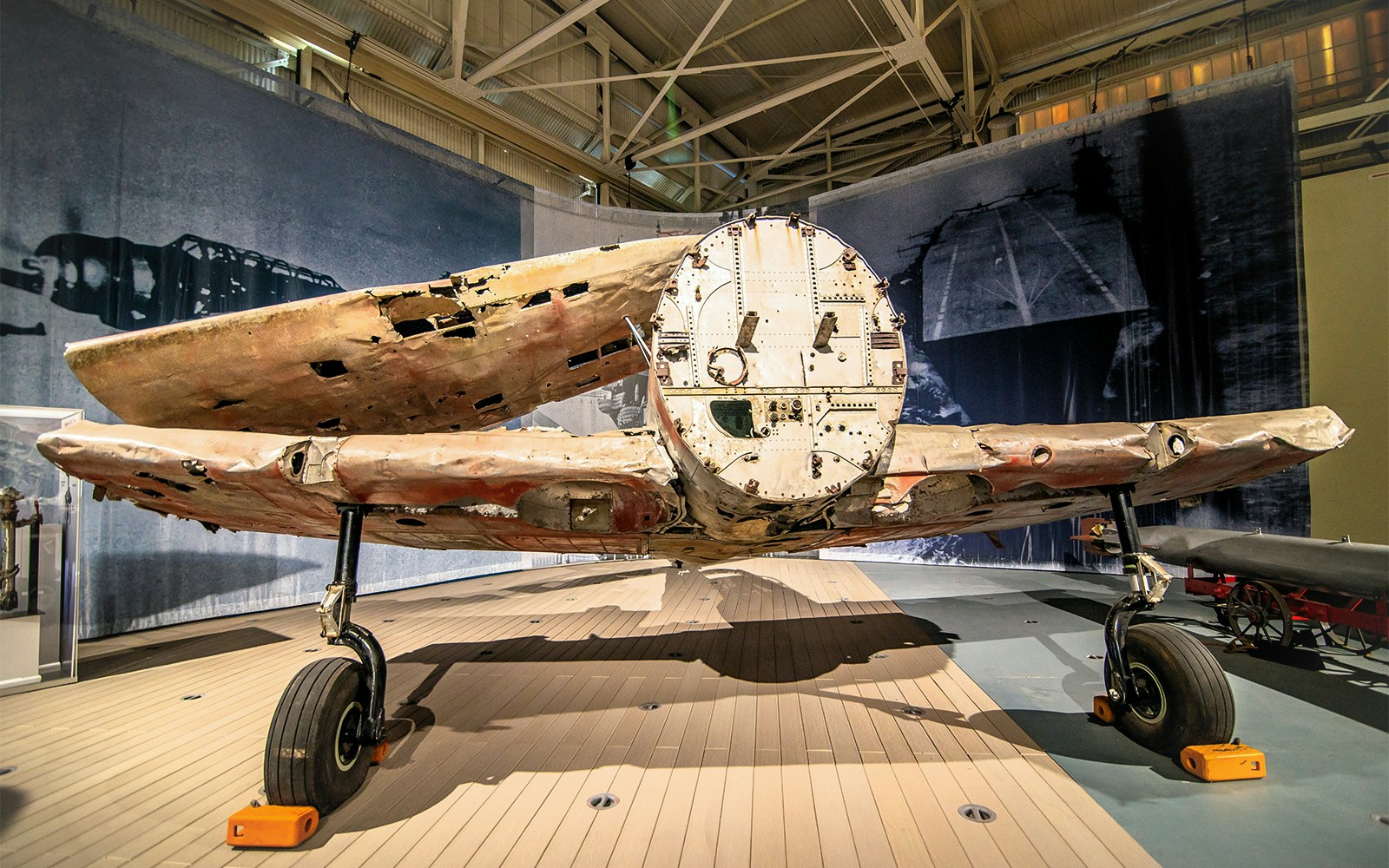 Damaged aircraft exhibit at Pearl Harbor Aviation Museum, Oahu.