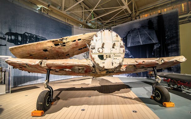 Damaged aircraft exhibit at Pearl Harbor Aviation Museum, Oahu.