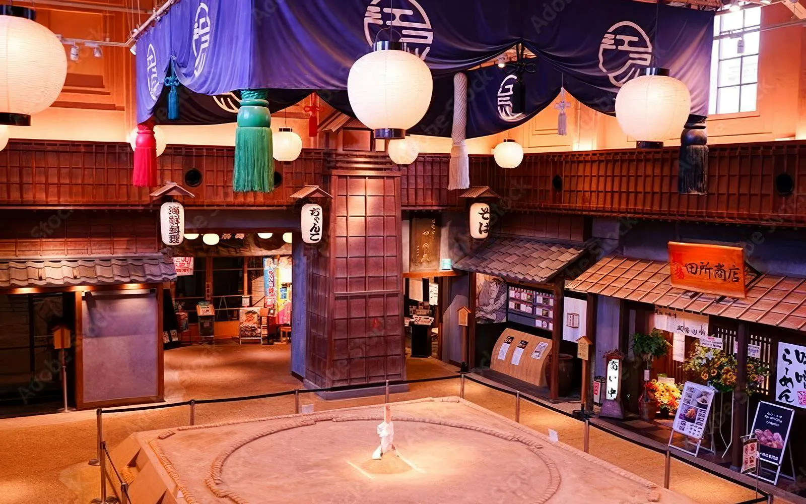 Sumo wrestling ring at Ryōgoku Kokugikan arena, Tokyo, with traditional Japanese decor.