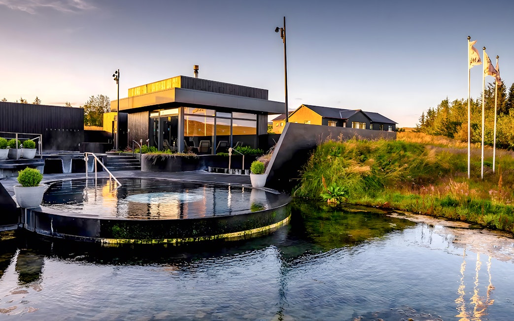 Krauma Geothermal Baths with modern architecture and natural surroundings in Iceland.