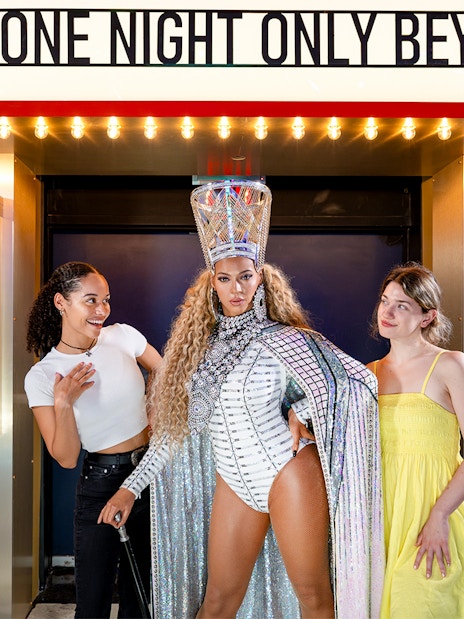 Two friends with Beyoncé's wax figure at Madame Tussauds, New York.