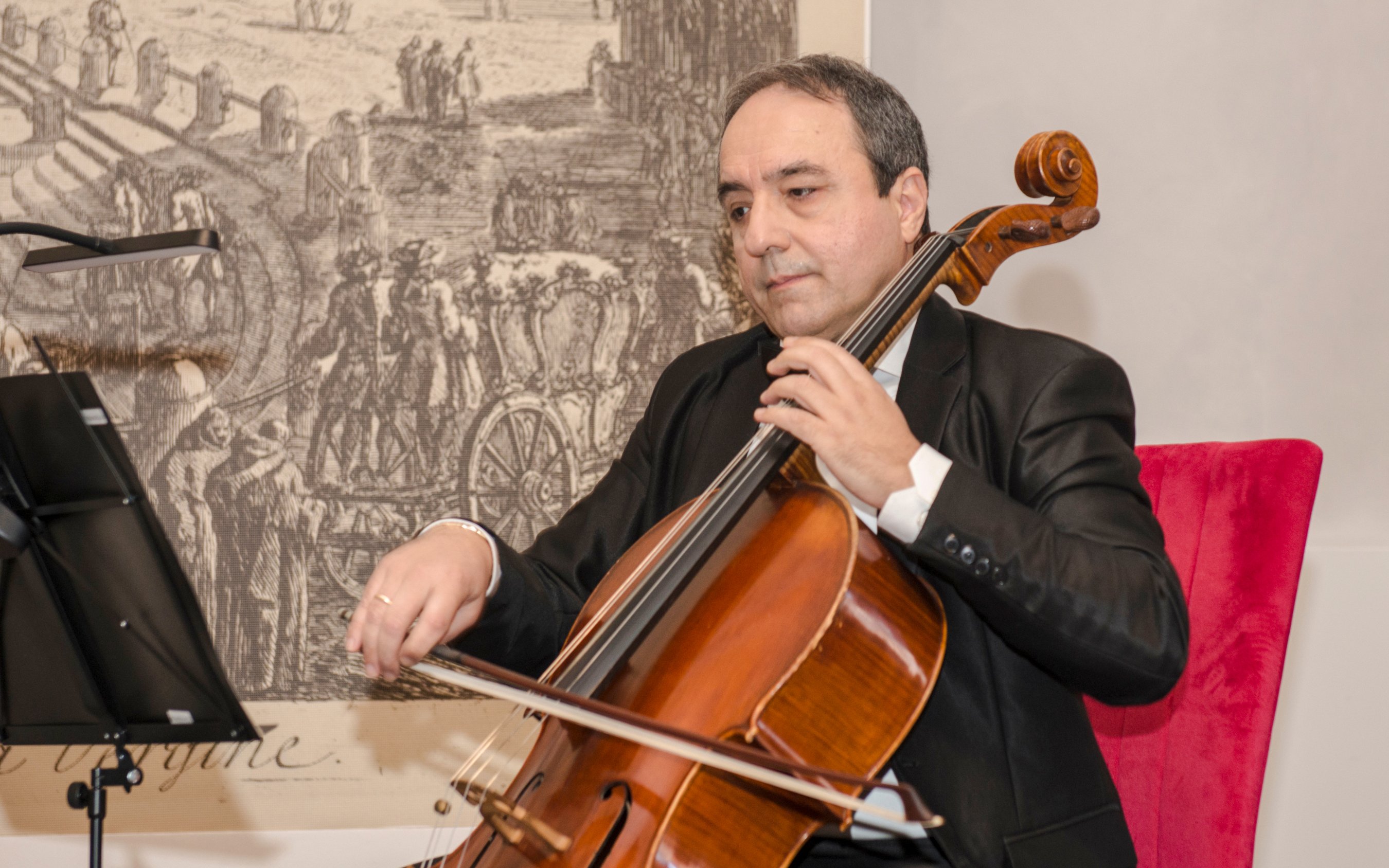 Cellist performing at Opera Concert, Palazzo Poli near Fontana di Trevi, Rome.