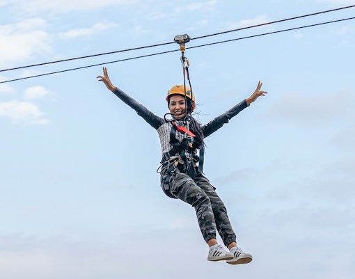 happy woman on Zipline