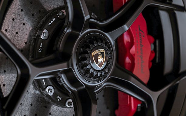 Lamborghini wheel detail on guided tour with hotel transfers.