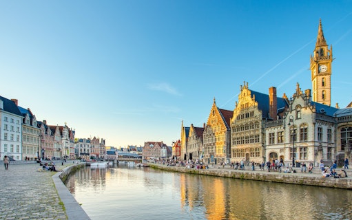 Graslei canal with historic buildings in Ghent city center, Belgium.