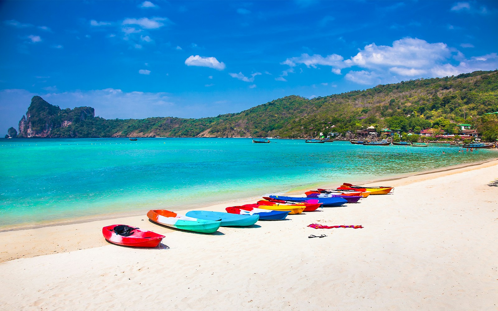 Colorful kayaks at Loh Dalam beach on Phi Phi Island, Thailand