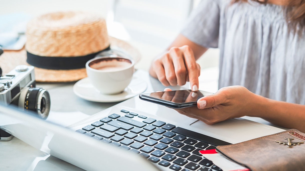 Tourists booking tickets online for a hassle-free experience in Paris, France.