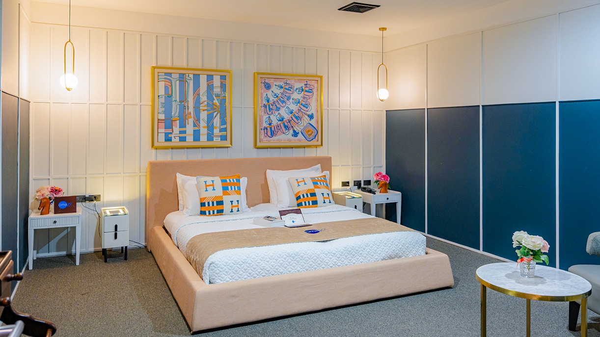 Luxurious bedroom in Coral Finest Business Class Lounge, Bangkok airport, featuring modern decor.