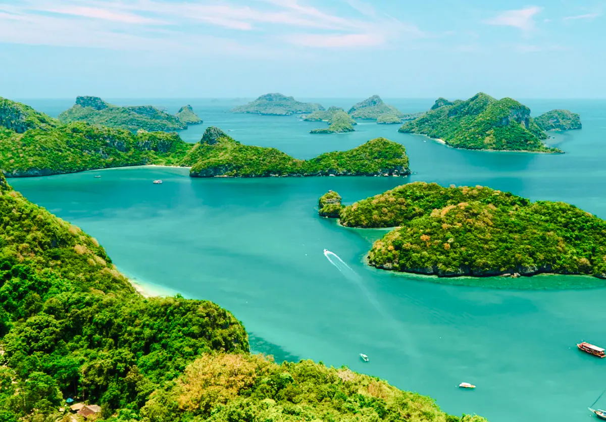 Koh Samui Ang Thong islands with speedboat on turquoise water, Thailand.