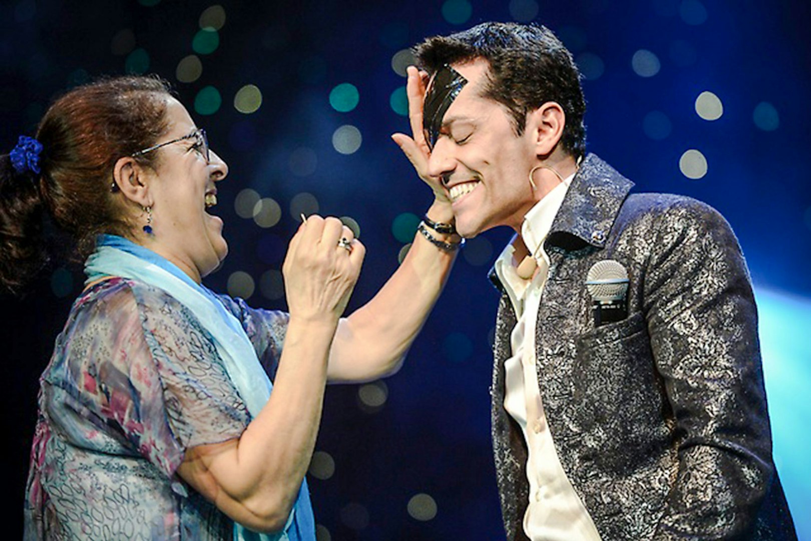 Audience member interacting with performer at Frederick Da Silva's PARANORMAL show in Vegas.