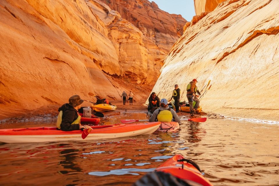 Kayakers navigating through Antelope Canyon on Lake Powell.