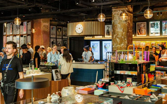 Guests browsing art and merchandise at Fotografiska Berlin store.