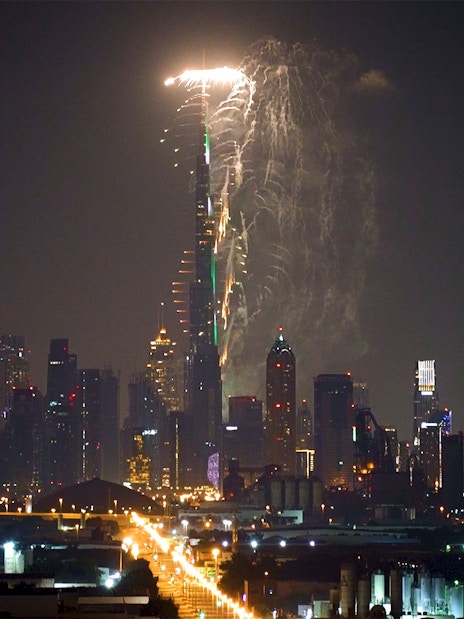 Burj Khalifa fireworks display during New Year’s Eve in Dubai skyline.