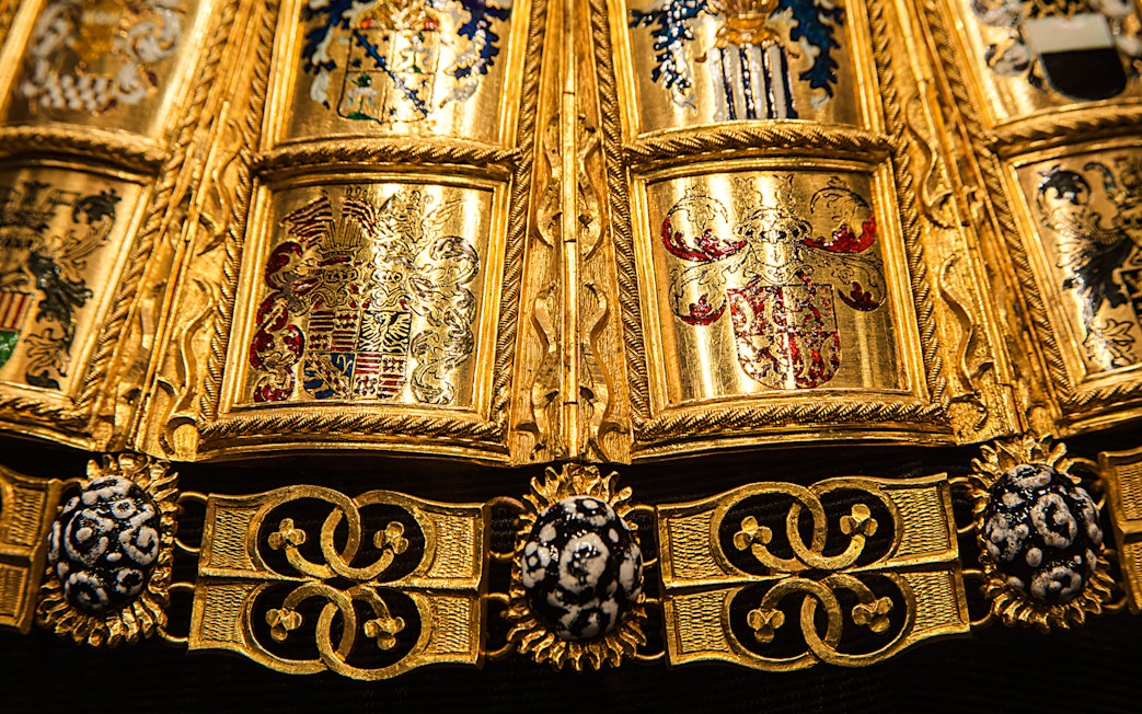 Golden ornate details of a ceremonial robe at the Imperial Treasury, Vienna.