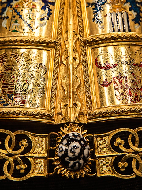 Golden ornate details of a ceremonial robe at the Imperial Treasury, Vienna.