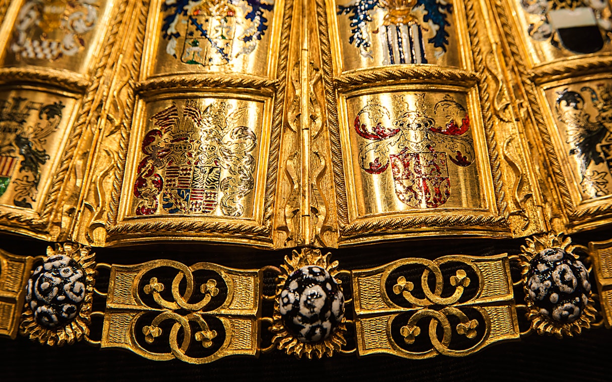 Golden ornate details of a ceremonial robe at the Imperial Treasury, Vienna.