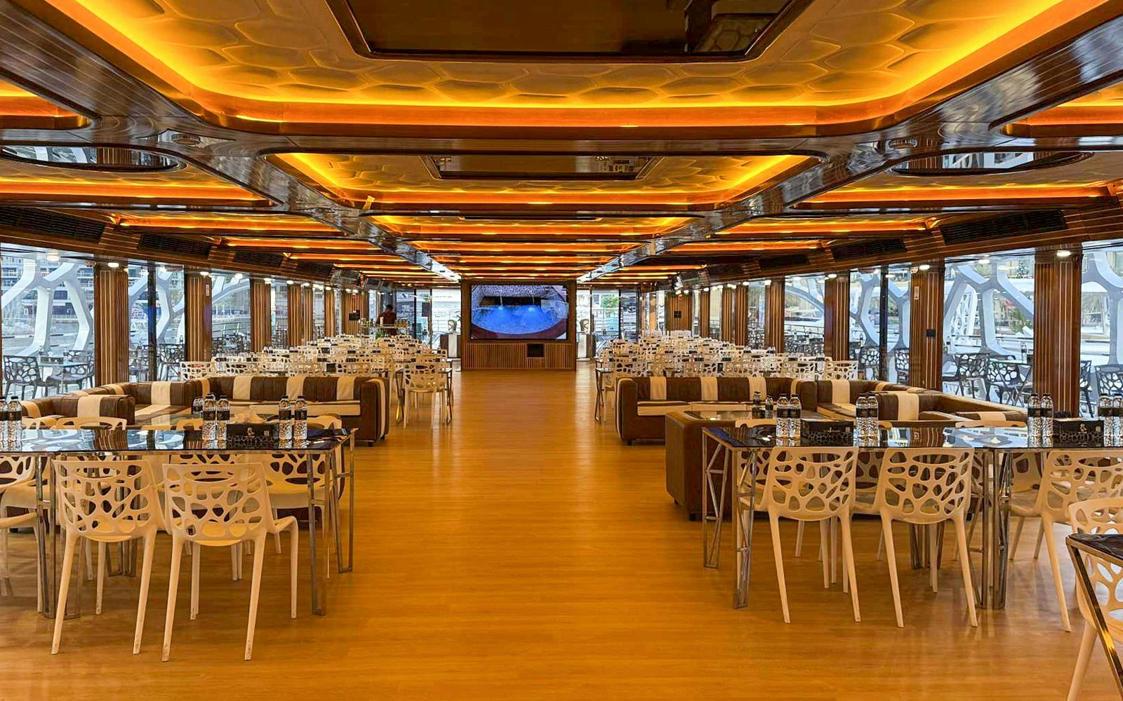 Dubai Marina yacht cruise with buffet dinner, unlimited drinks, and live entertainment.