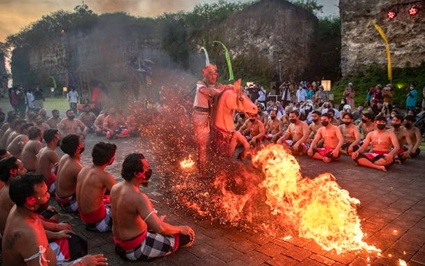 Kecak dance performance with fire at Garuda Wisnu Kencana, Bali.