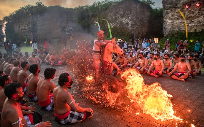 Kecak dance performance with fire at Garuda Wisnu Kencana, Bali.