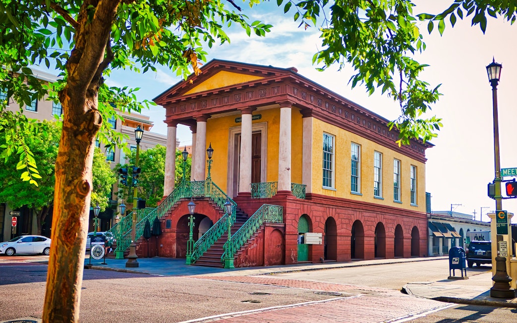 Historic Charleston City Market building with columns and stairs in Charleston.