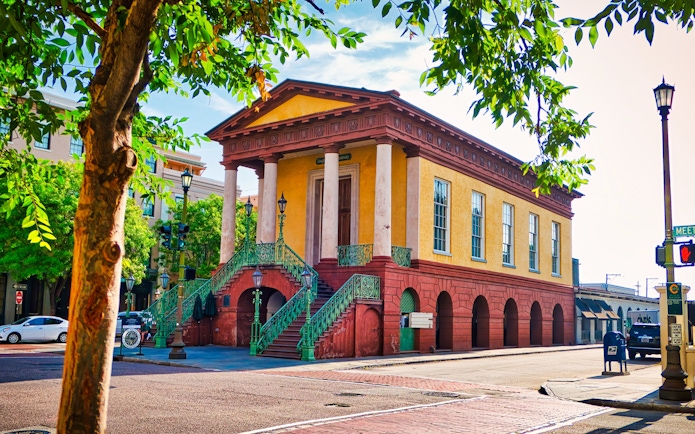 Historic Charleston City Market building with columns and stairs in Charleston.