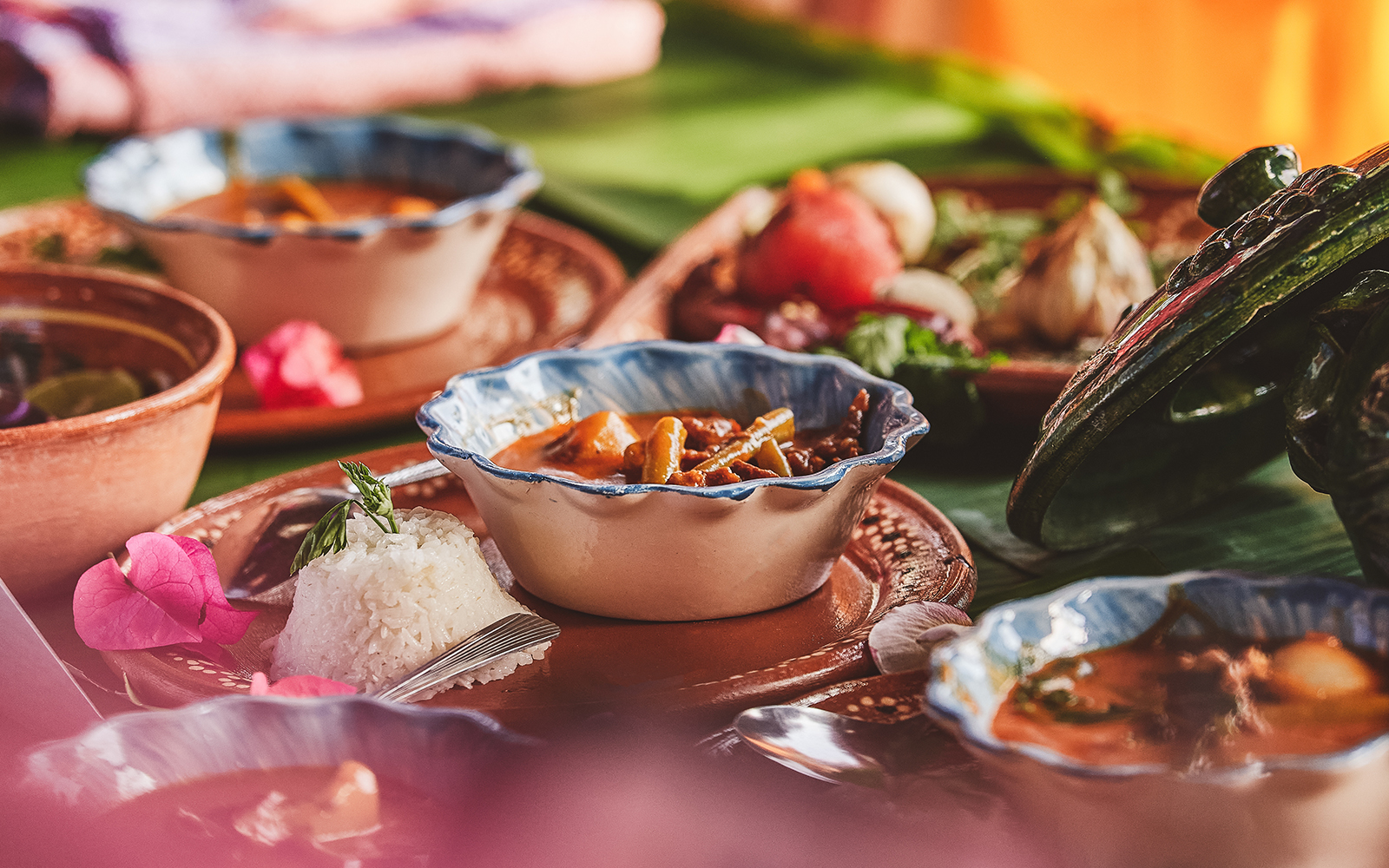 Oaxacan street vendor preparing traditional food in Oaxaca City, Mexico.