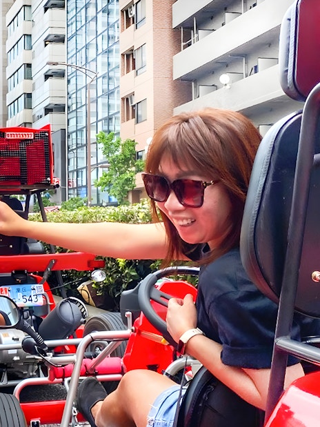 Participants go-karting near Tokyo Tower at Tokyo Bay.