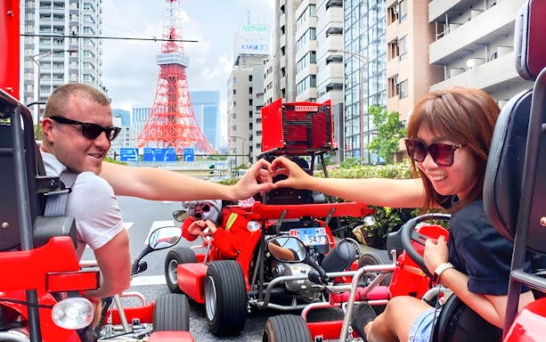 Participants go-karting near Tokyo Tower at Tokyo Bay.