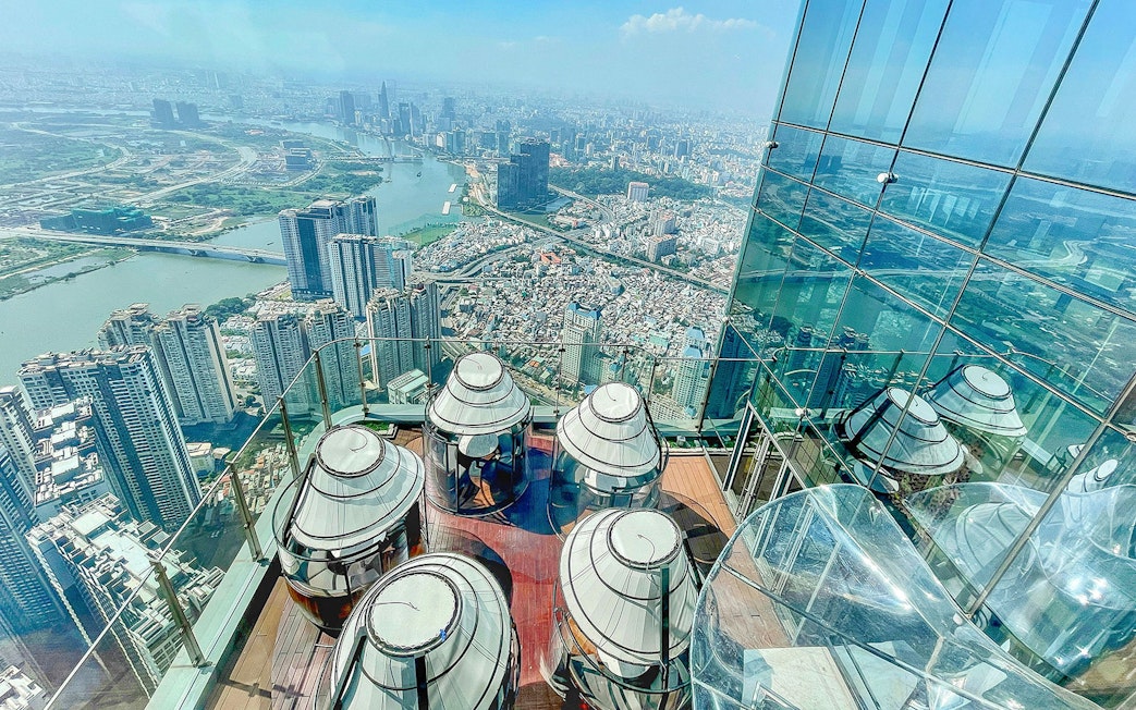 Skyview from Landmark 81 in Saigon overlooking cityscape and river.